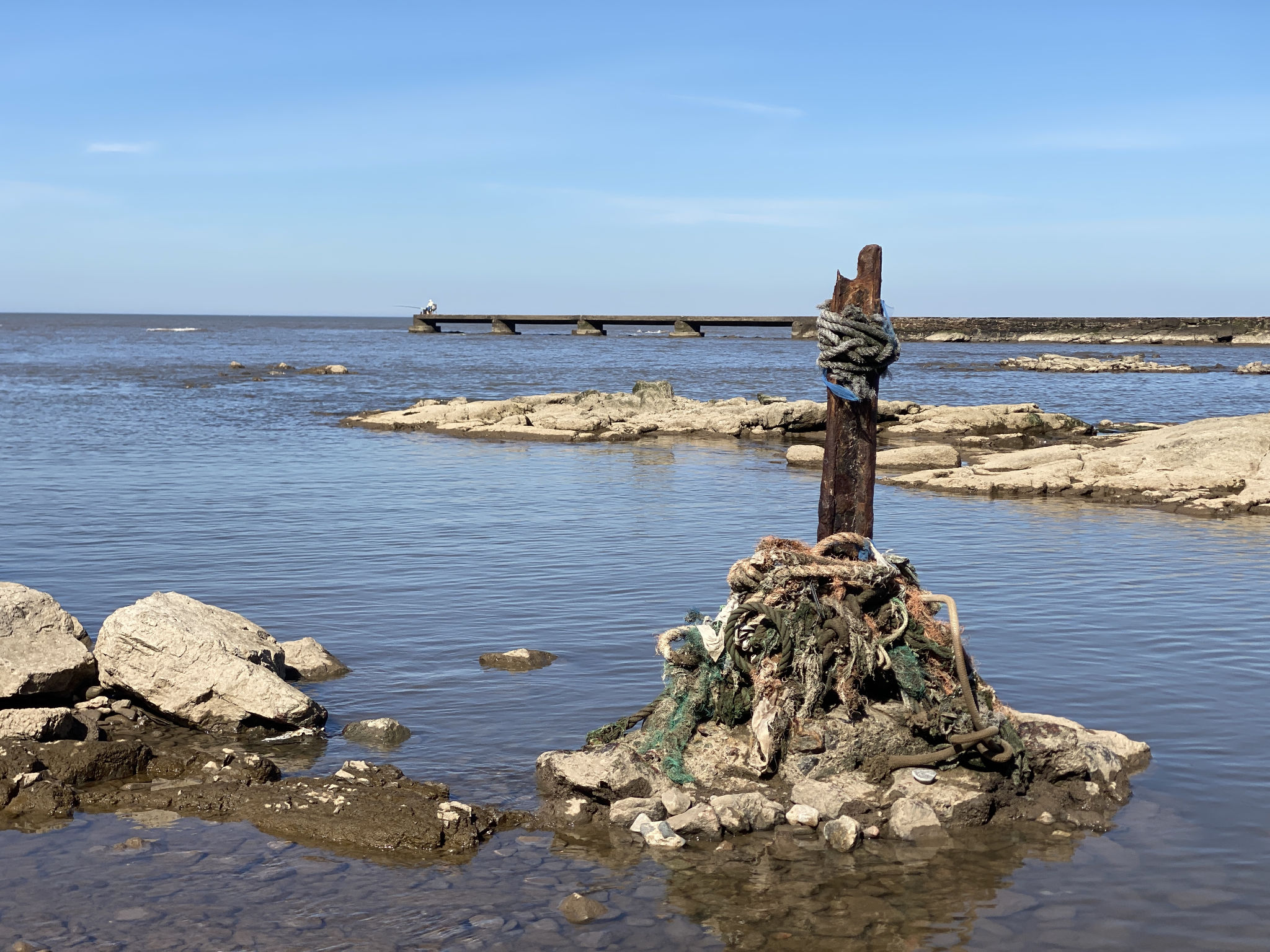 Pêcheur sur la jetée